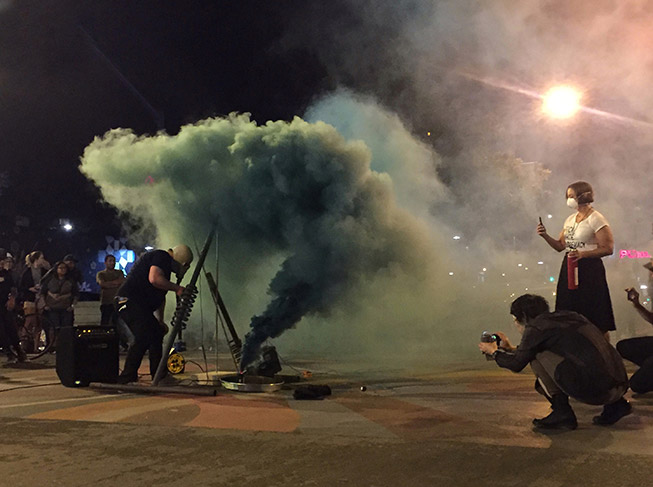 Image of a performance of Sympathy at SubZERO, with noise and smoke.