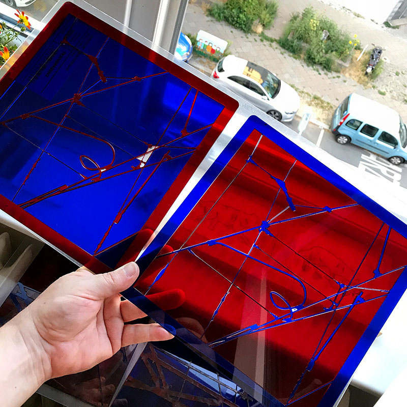 Transparent blue and red acrylic cutouts