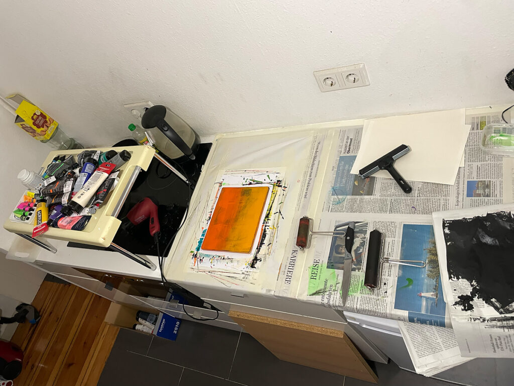An overhead view of a printmaking area