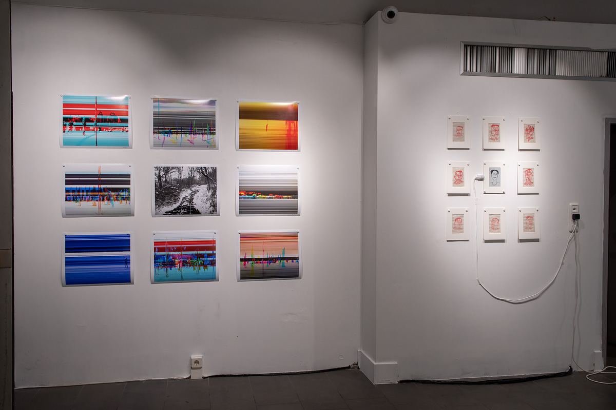 Photographs hanging on a wall