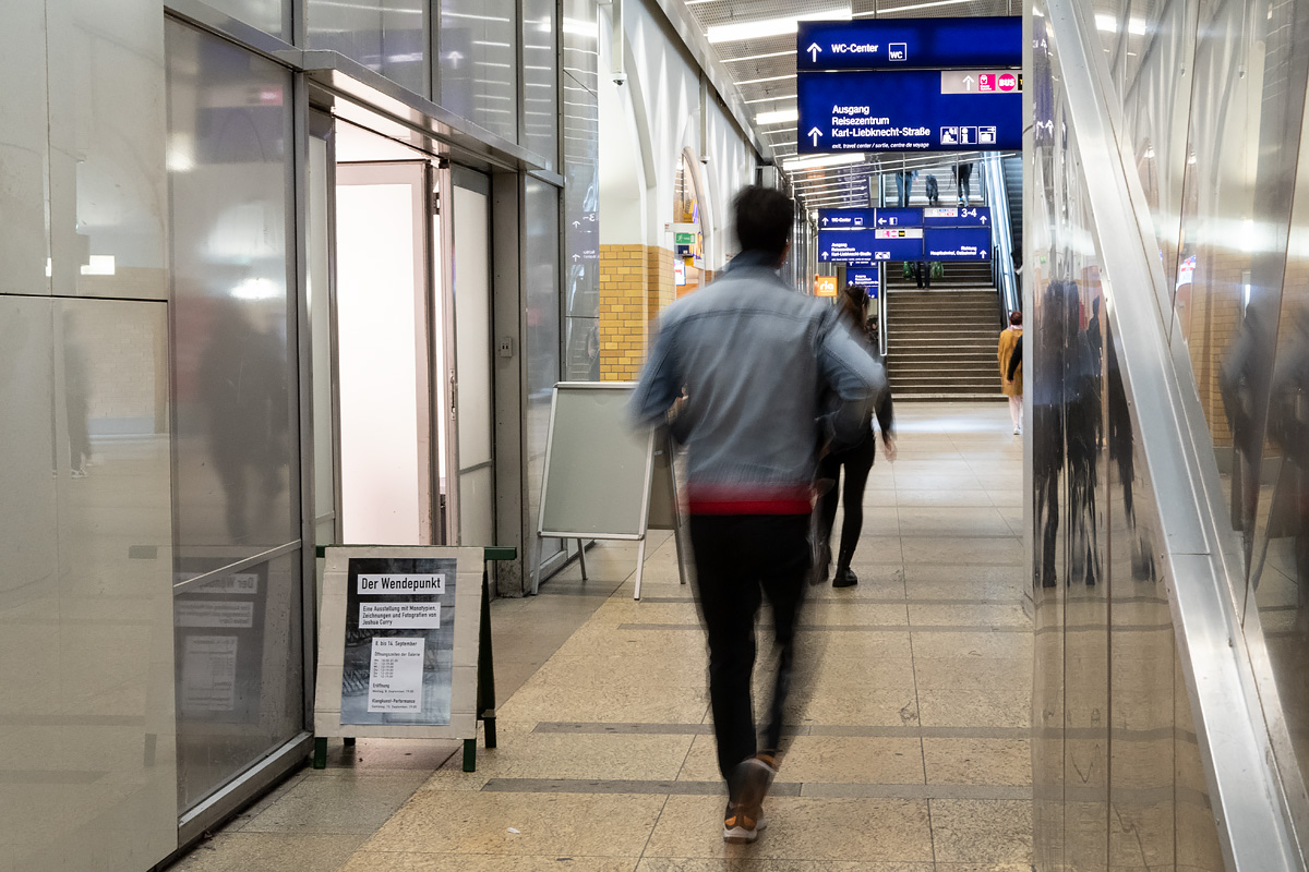 People walking in train station